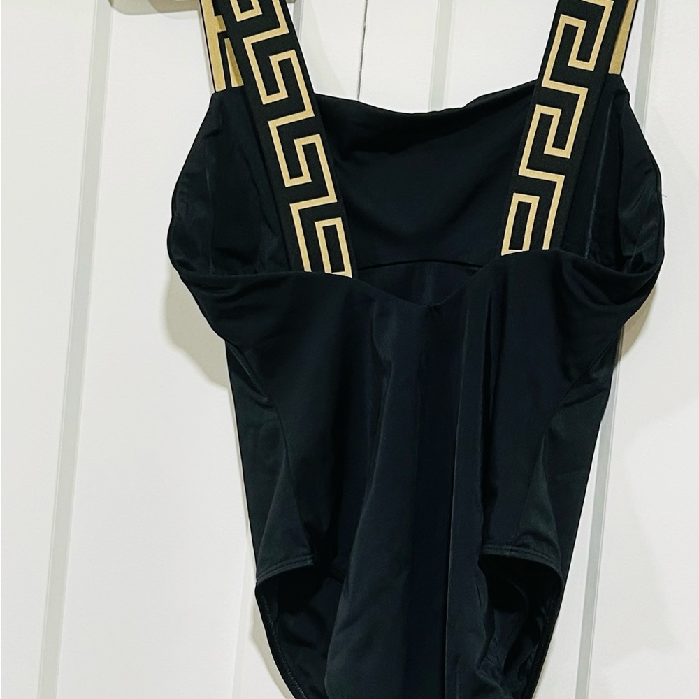 Black & gold Versace swimwear